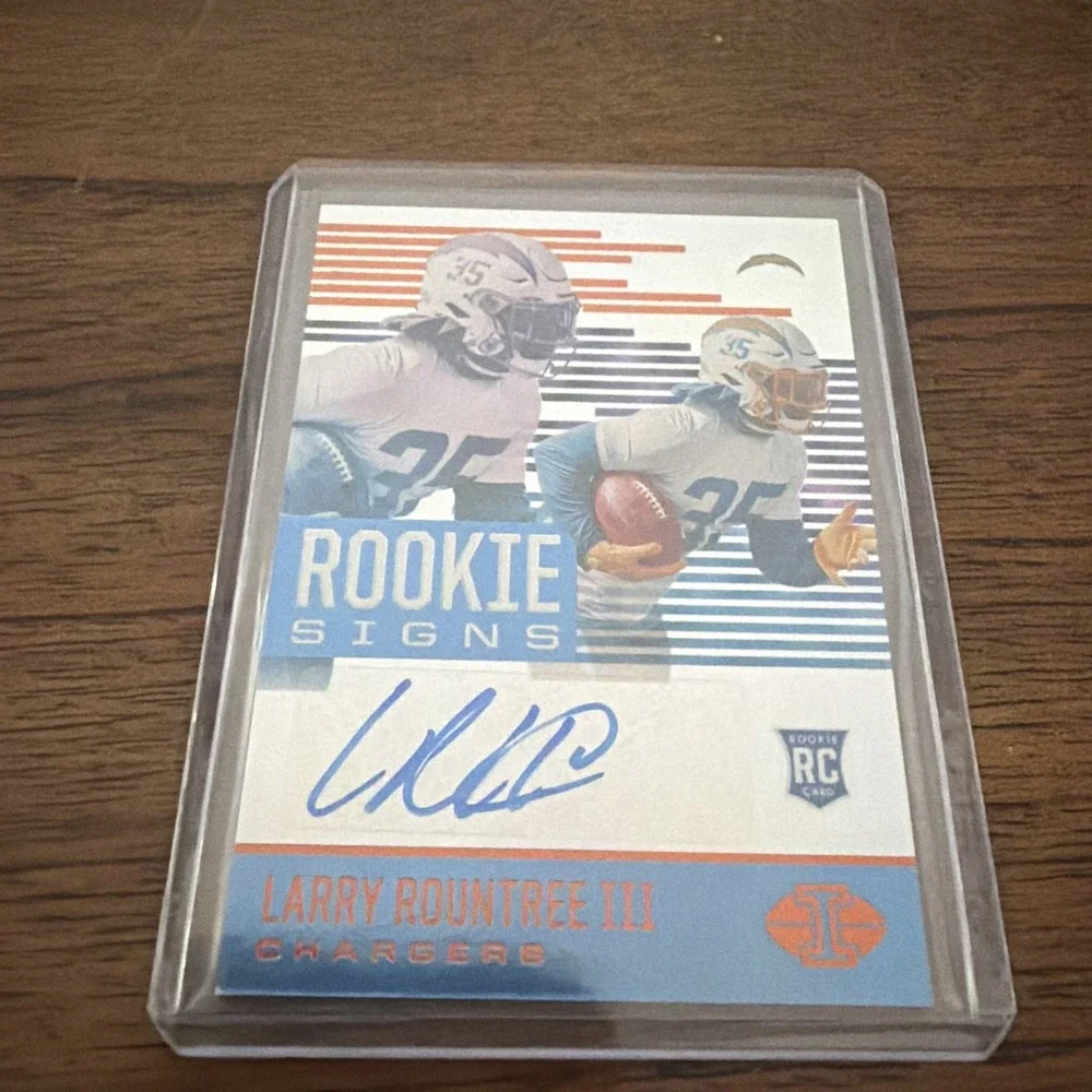 2021 Panini Illusions Rookie Signs Autograph card featuring Larry Rountree‎ III.